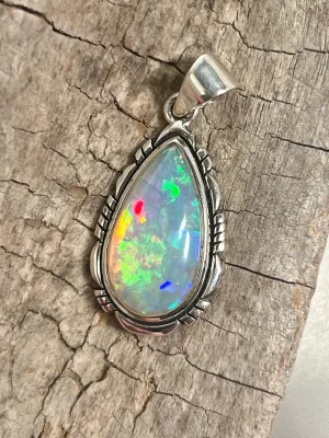 Ethiopian Opal Teardrop Shaped Pendant with Detailed Setting