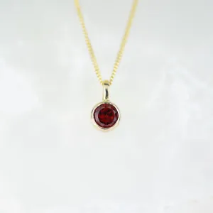 Gold 5mm Garnet Andromeda Pendant