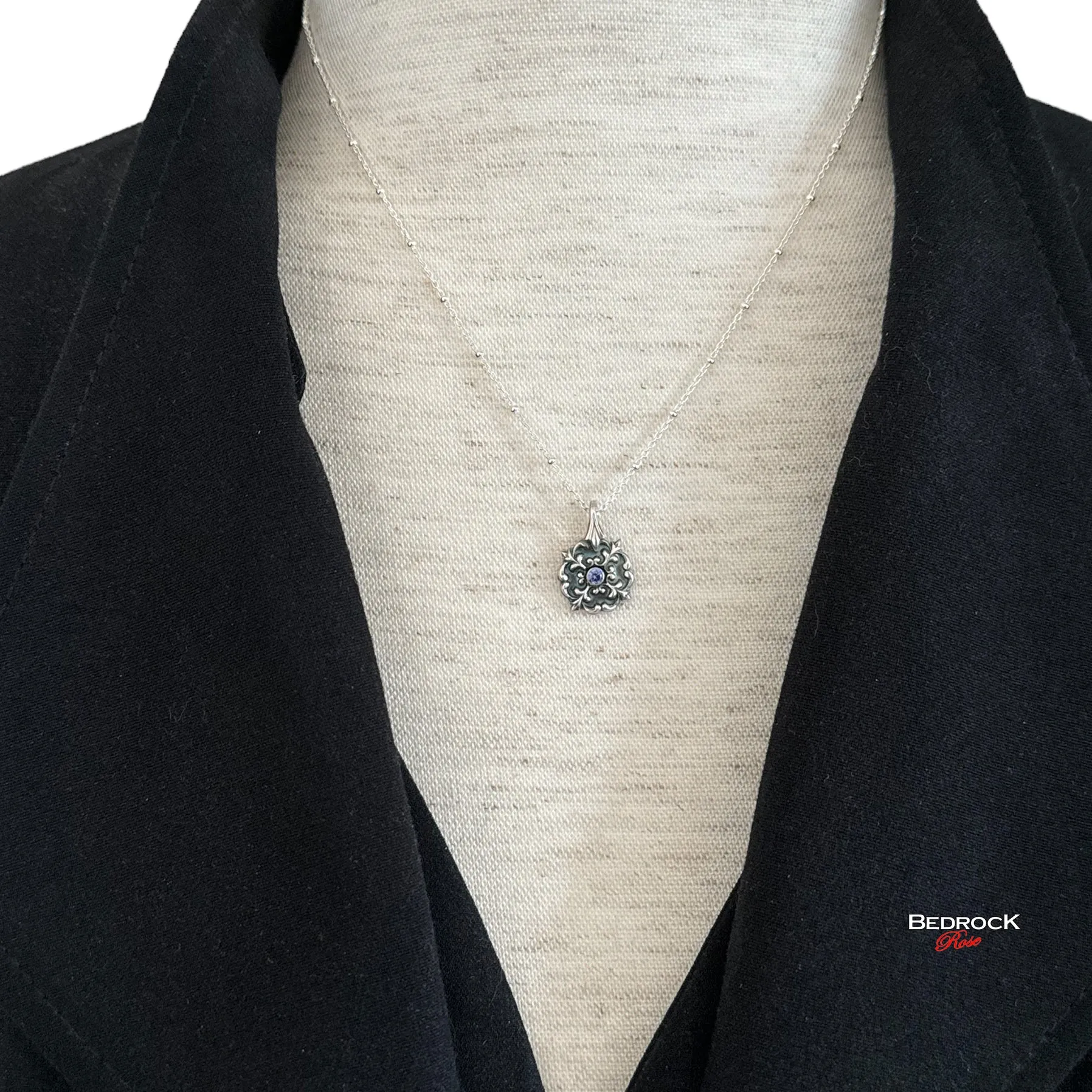 Petite Silver Flourish Pendant with Tanzanite
