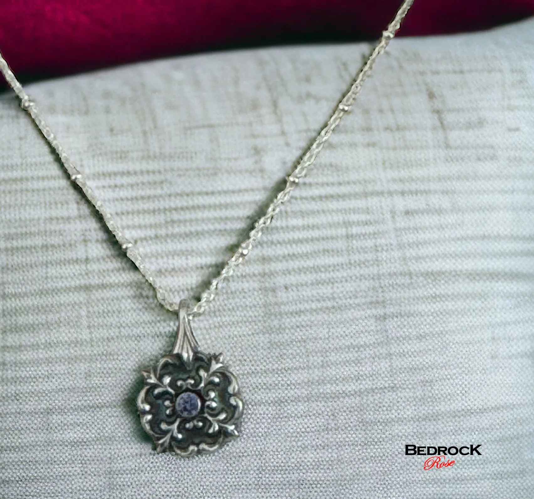 Petite Silver Flourish Pendant with Tanzanite