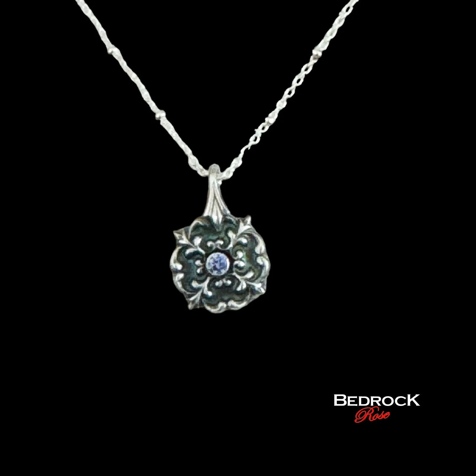 Petite Silver Flourish Pendant with Tanzanite