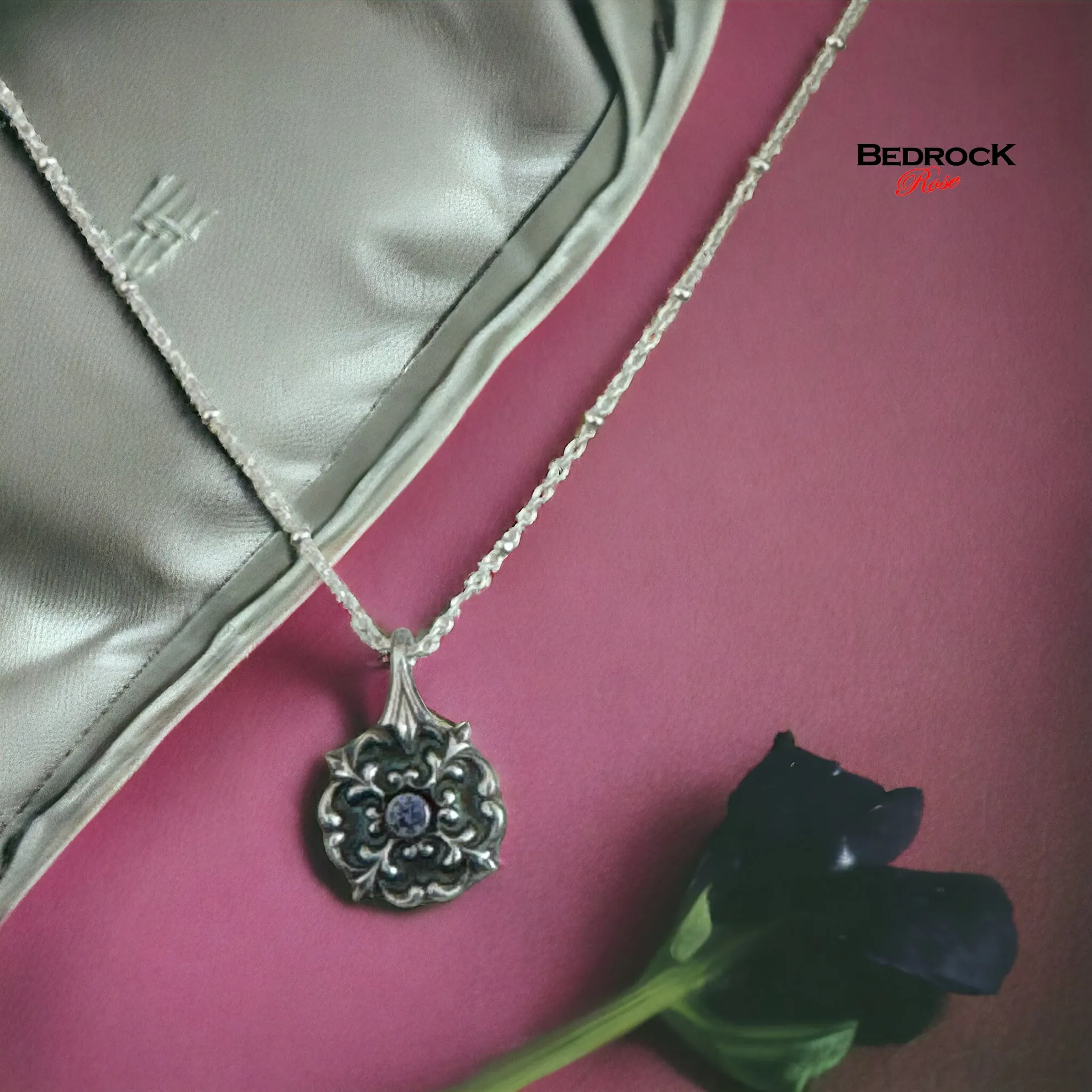 Petite Silver Flourish Pendant with Tanzanite