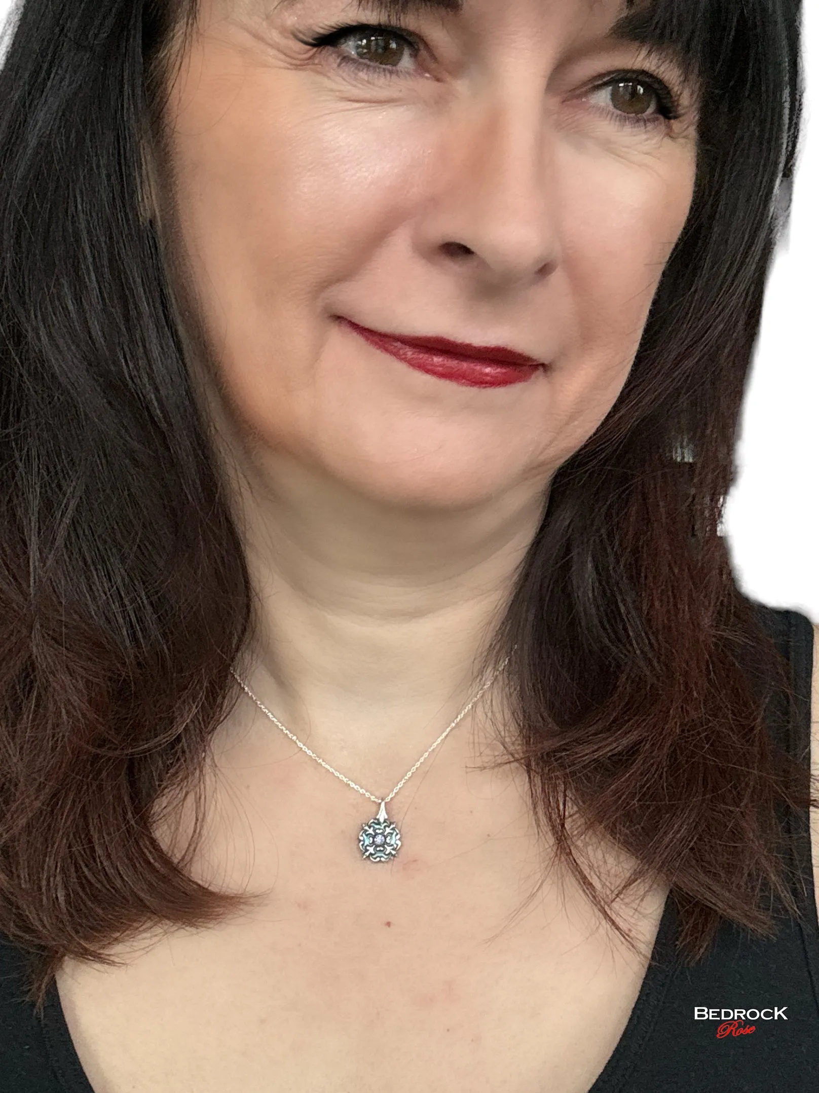 Petite Silver Flourish Pendant with Tanzanite