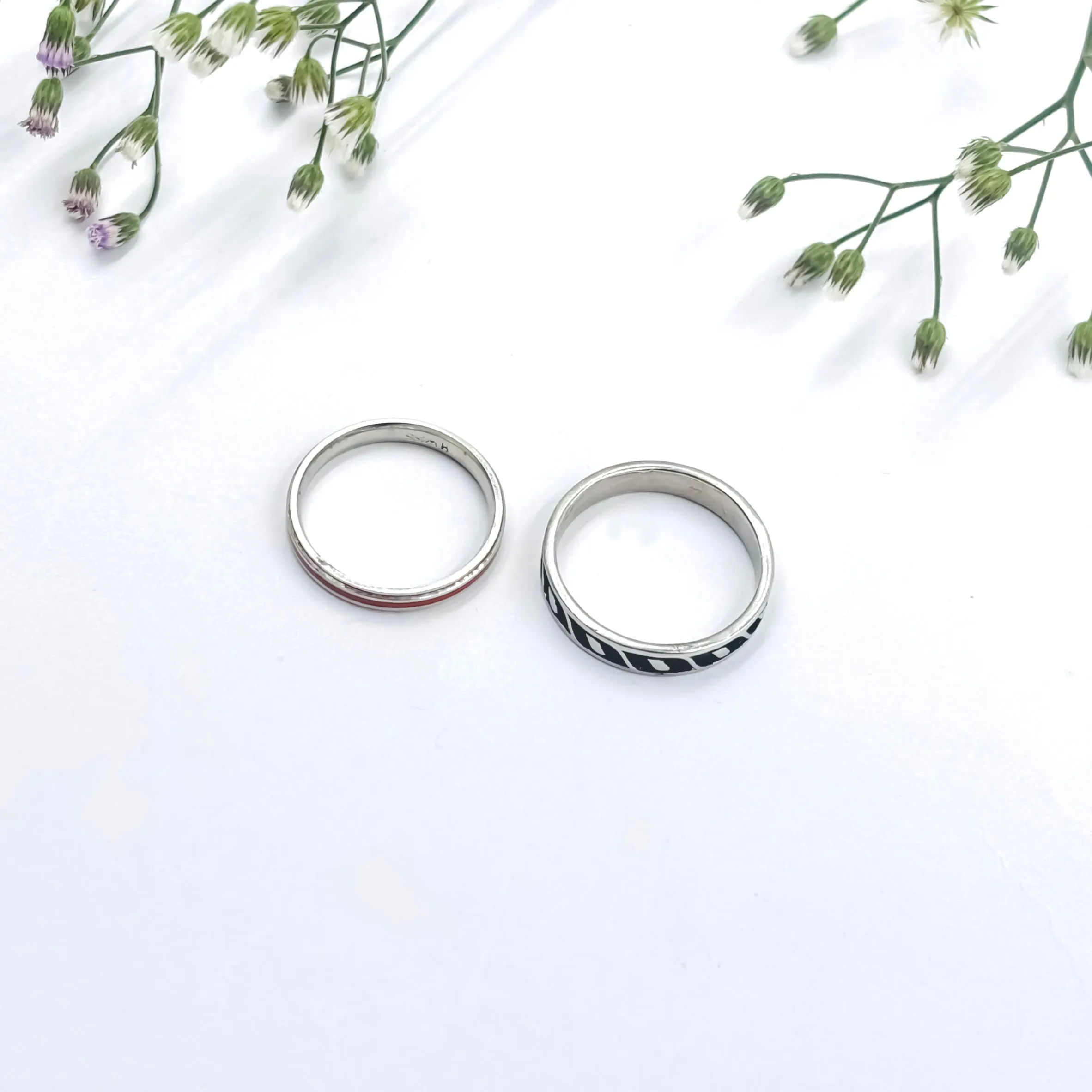 Simple yet Beautiful Silver Couple Rings with Central Design Detail.