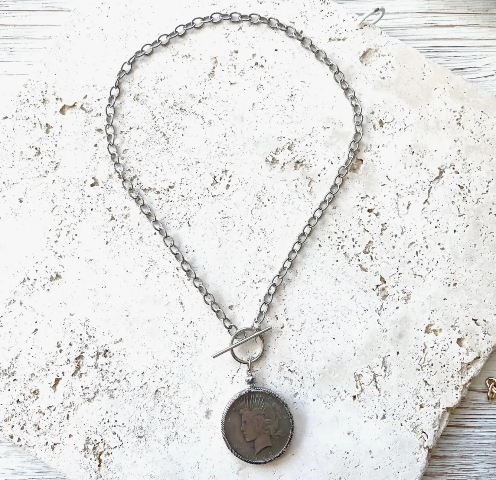 The Peace Coin medallion statement necklaces with toggle